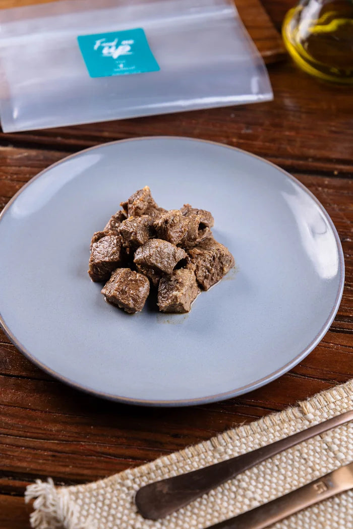 PORÇÃO DE MIGNON BOVINO GRELHADO EM CUBINHOS 100GR